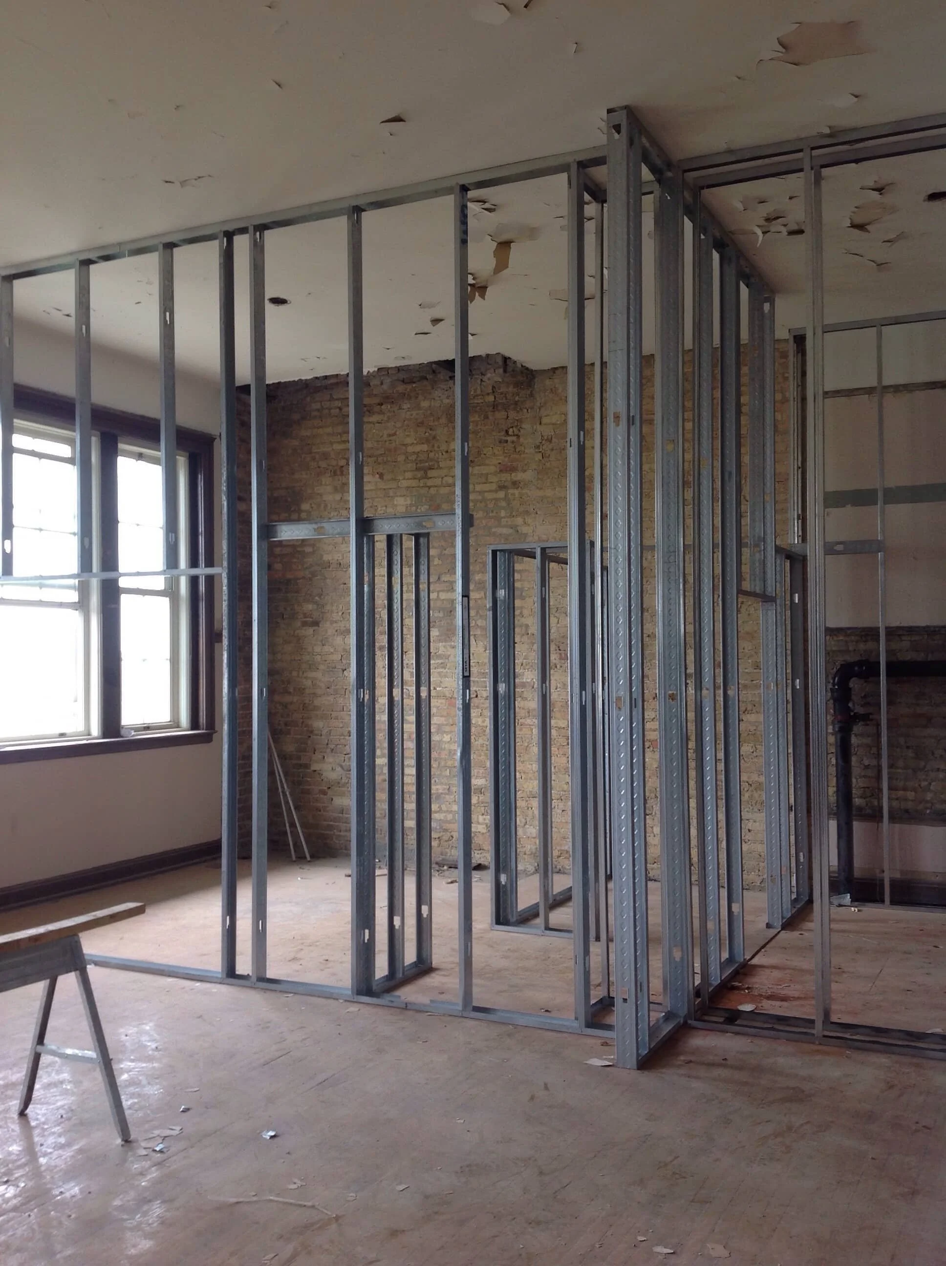 Interior metal stud framing — Stewart School Chicago renovation